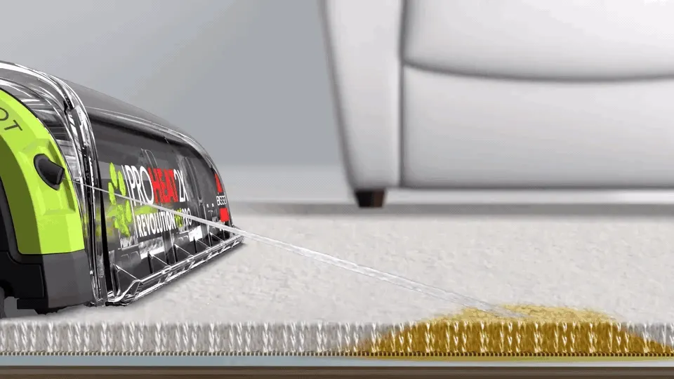 The pretreat button sprays solution directly onto the stain before the main passes.