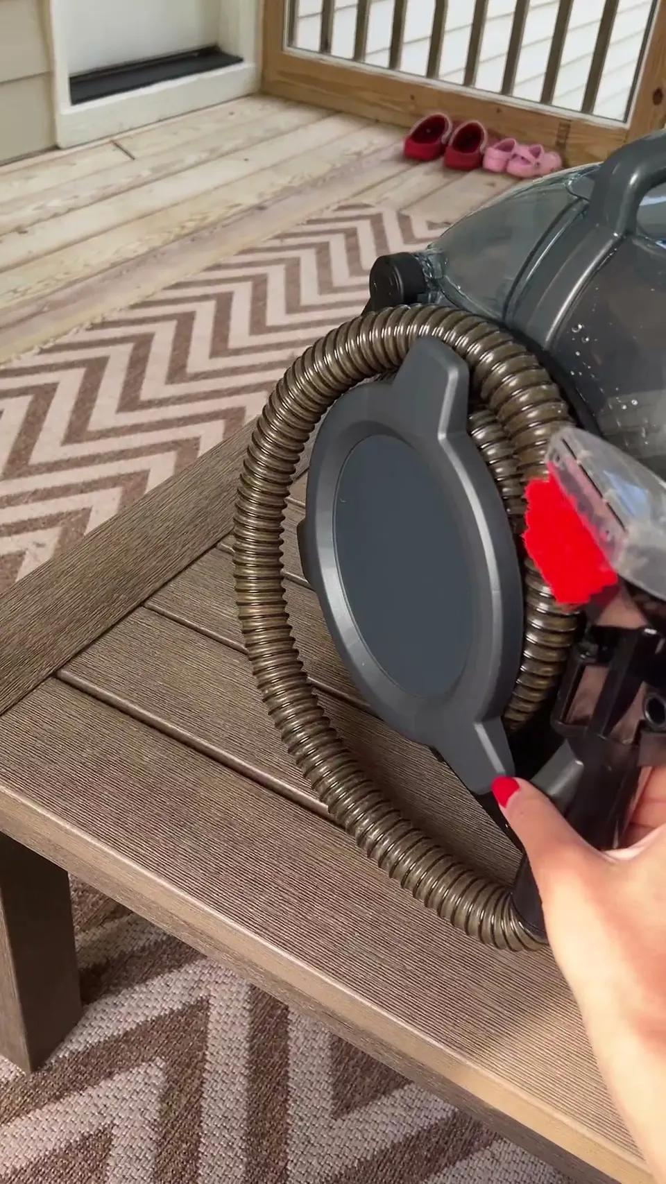 The hose and cord wrap and lock, so it stores compact and comes out ready for a spill fast.