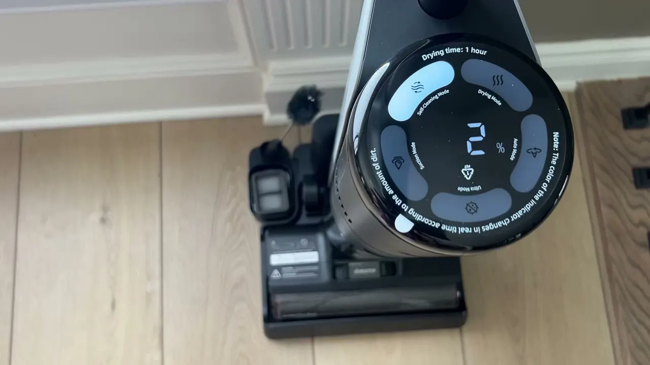 The self-clean cycle runs on the dock, with progress on the dial.