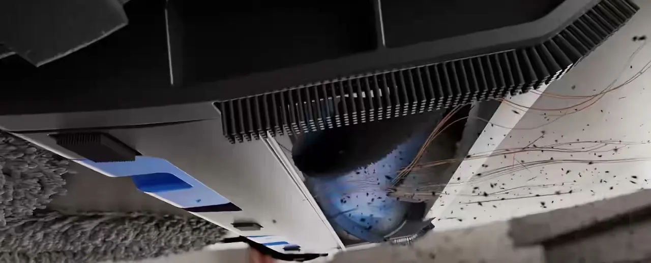 Ecovacs credits the comb teeth along the intake for keeping hair off the roller.